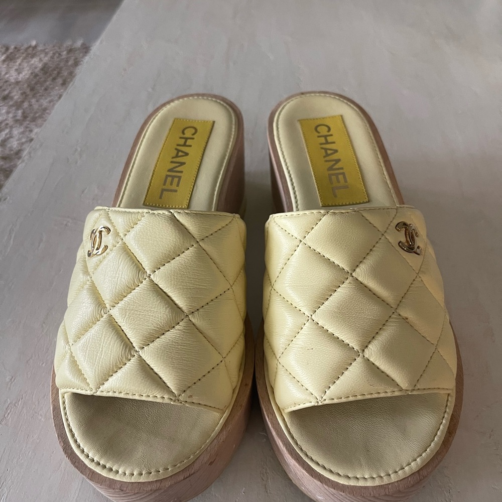 CHANEL Cream Quilted Mules